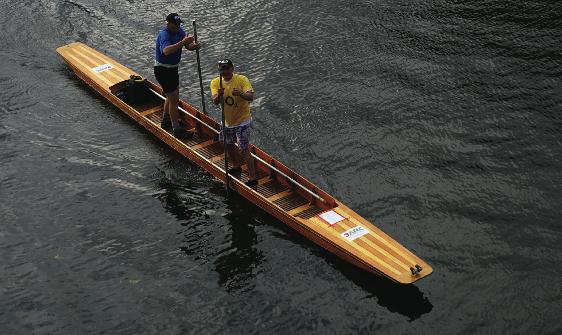 Mike Hart and Dom Harlow in a wooden punt on the thames in September 2010